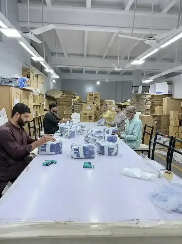 Final packing line at SAS Agencies with bundles wrapped and labelled for export